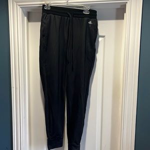Dark gray or black Adidas joggers